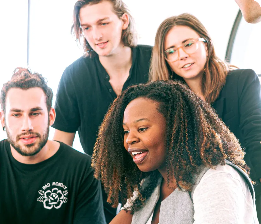Startup agreement represented by a young team of entrepeneurs